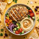 CAVA calories guide: Mediterranean bowl with grilled chicken and hummus
