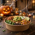 chipotle boorito halloween burrito bowl with jack-o-lantern