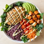 CoreLife Eatery menu prices 2026 healthy grain bowl with grilled chicken, purple rice, sweet potato and avocado