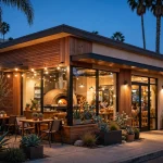 California Pizza Kitchen locations storefront at dusk