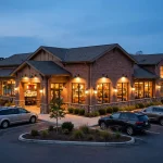 Golden Corral restaurant glowing at dusk amid golden corral closing restaurants news in 2026