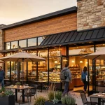 Panera Bread locations near me: bakery-cafe storefront at golden hour