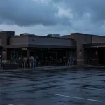 Wendy's franchisee store closures: empty restaurant at dusk